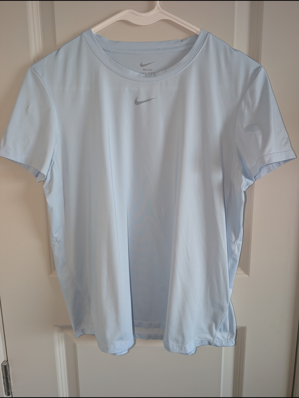 NWOT Nike Women's Light Blue Dri-FIT Shirt